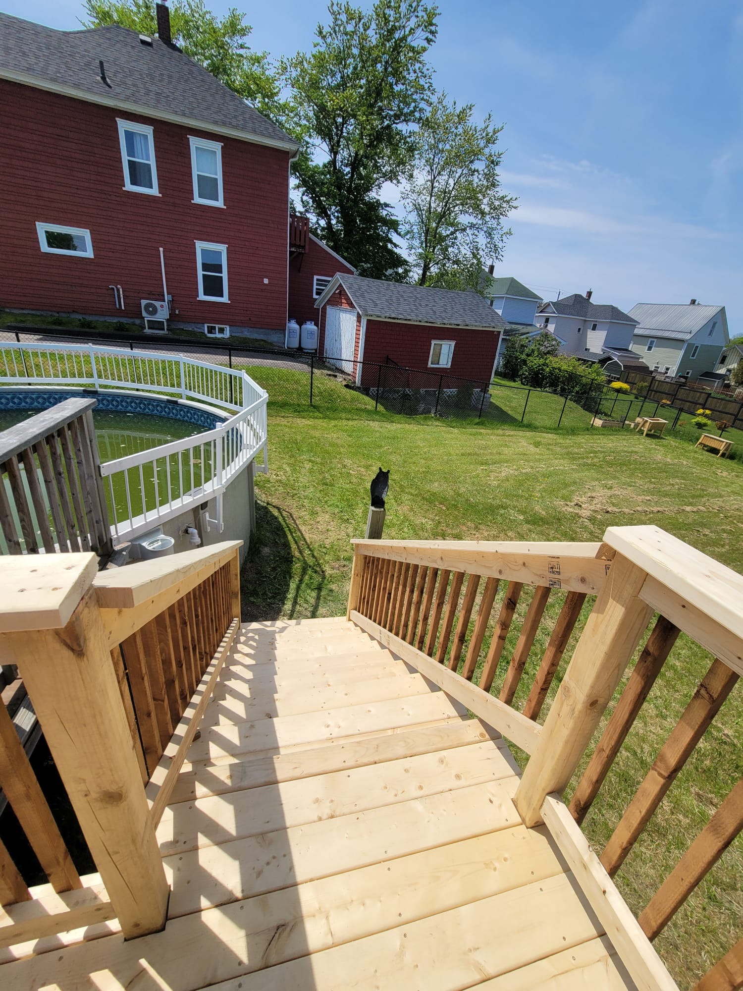 Aging deck landing rebuilt with new stairs — after, Cambridge