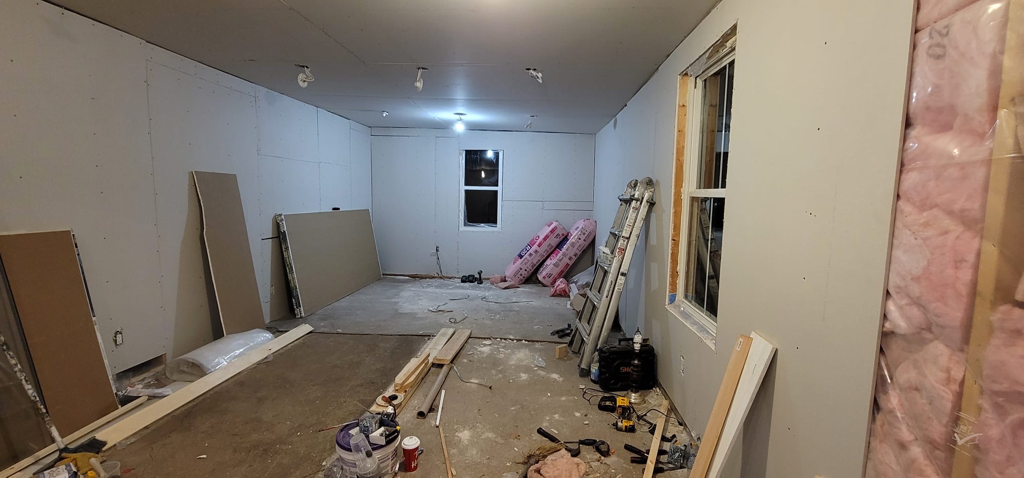Bare garage framing to boarded interior — after, Guelph