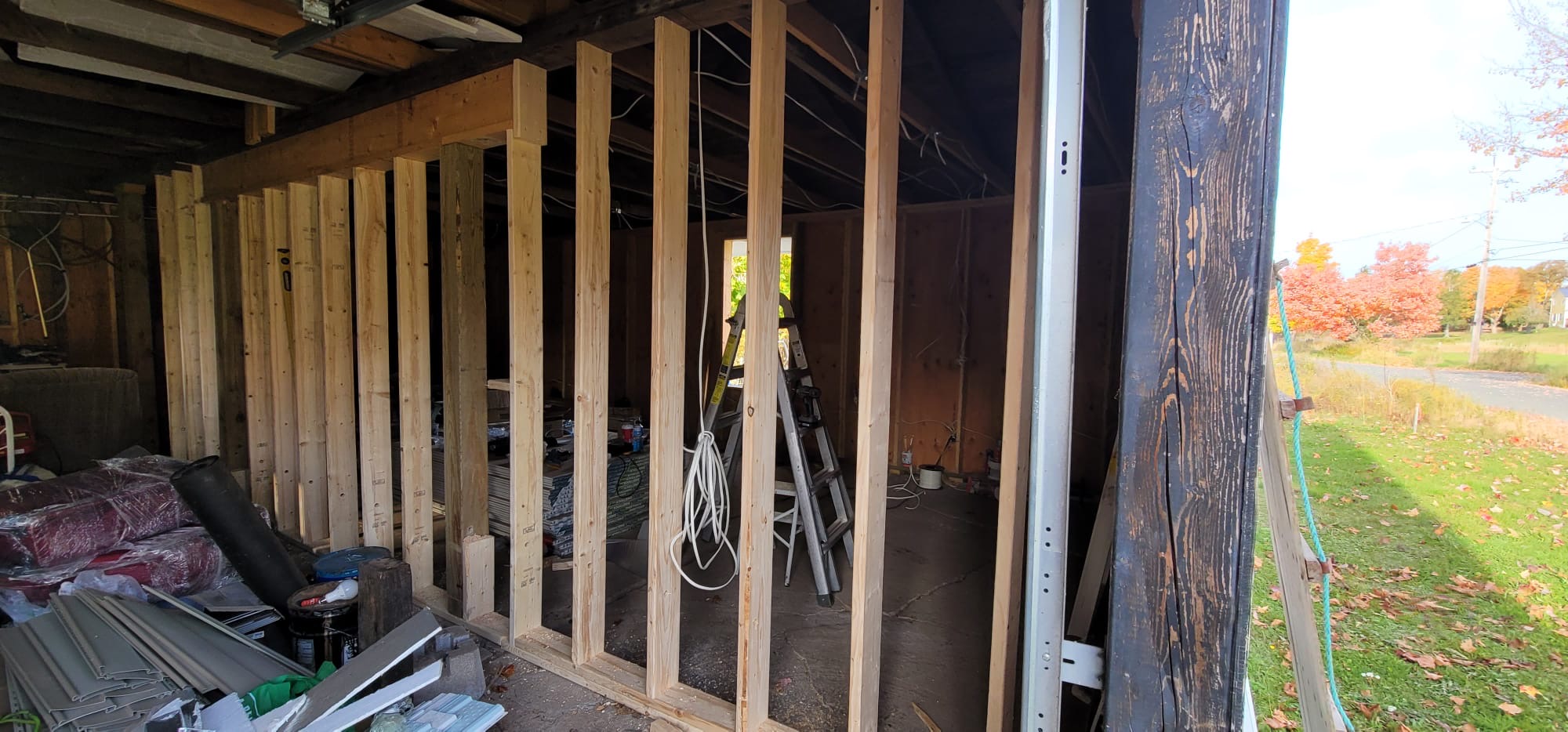 Bare garage framing to boarded interior — before, Guelph