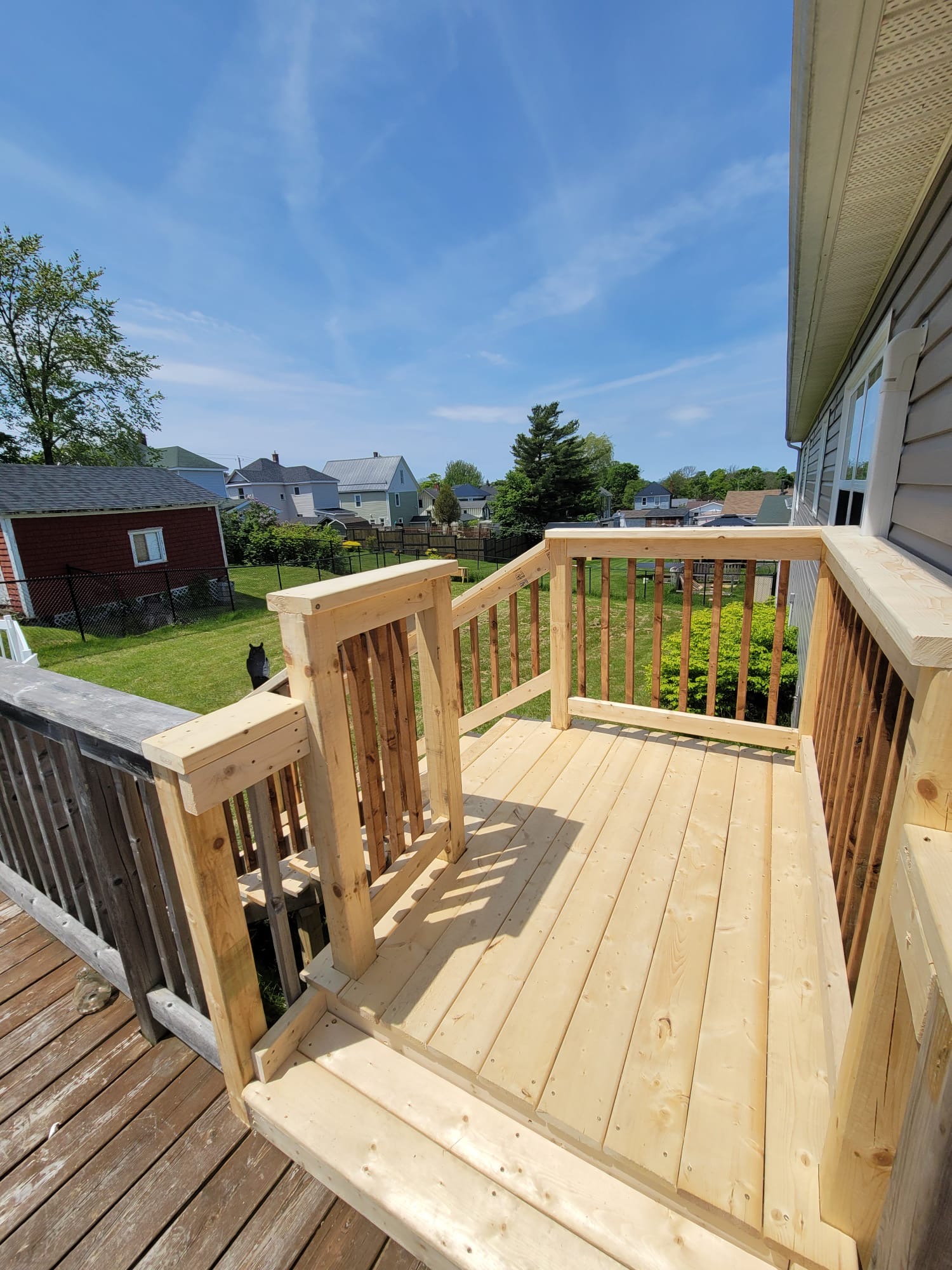 Aging deck landing rebuilt with new stairs — before, Cambridge